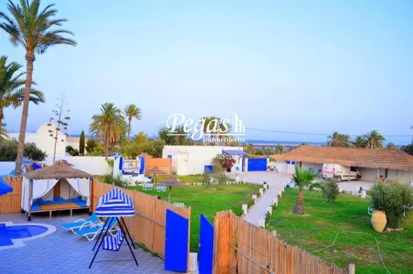 photo bien Une maison avec piscine pour la location dans la zone touristique Djerba